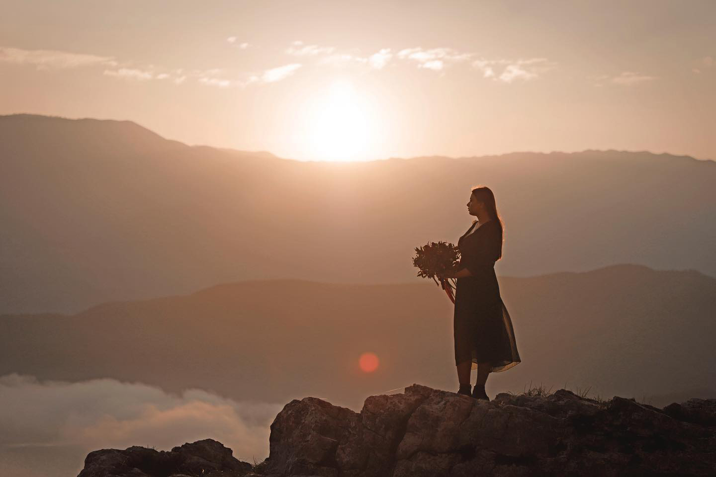 Traveler portrait with mountain and lake views at Bovilla Lake