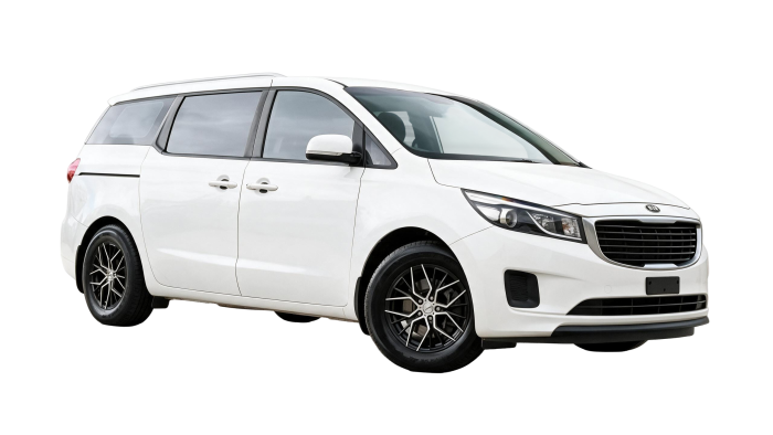 Kia Carnival 2018, white, 6+1 — the transport van used for hotel pickup and drop-off